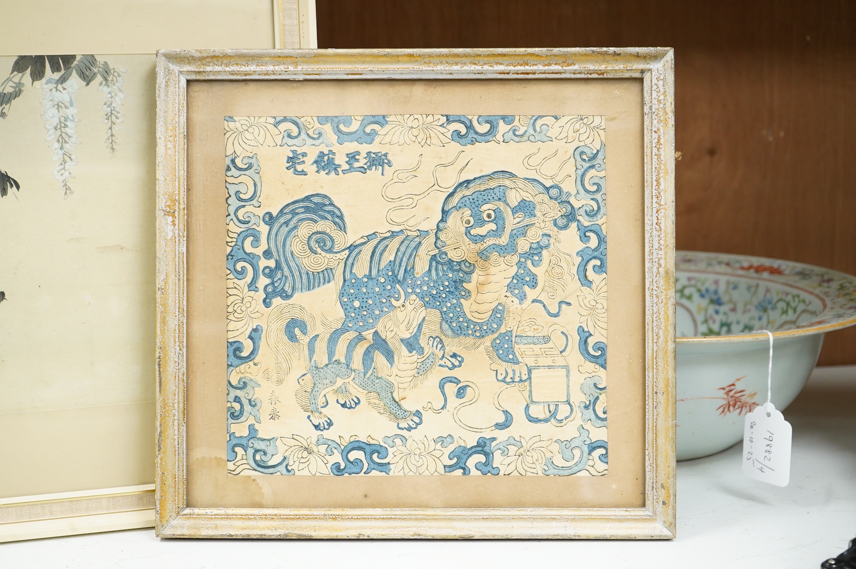 Ogata Gekko (1859-1920), Wisteria and carp, Japanese woodblock print and a Chinese woodblock of a lion dog, 23 x 23cm